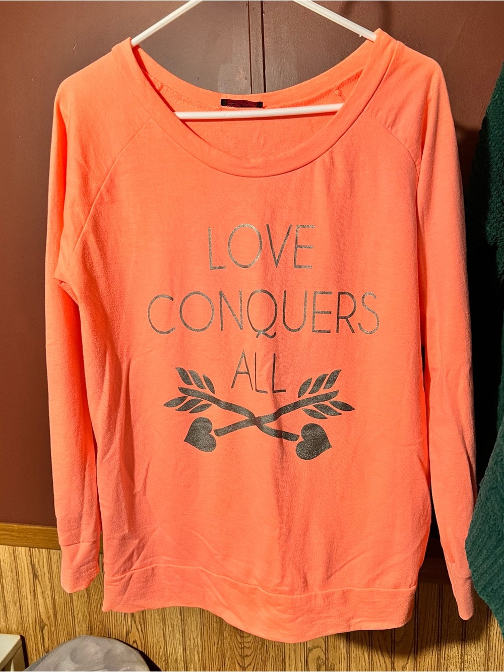 Coral 'Love Conquers All' Graphic Sweatshirt